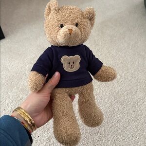 Plus teddy bear in a shirt